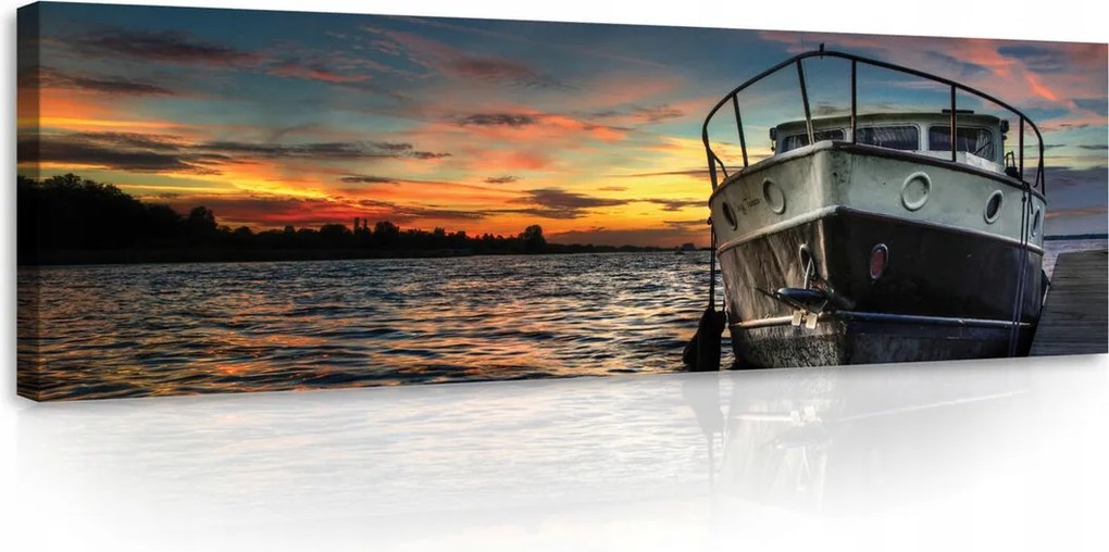 Vászonkép 145x45 Naplemente a vízen Csónak a parton esti nyugalom