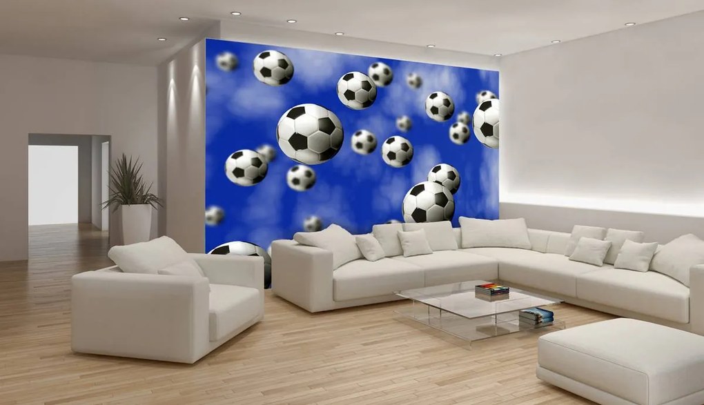 Fotótapéta - Futball-labdák a kék háttérben (152,5x104 cm)