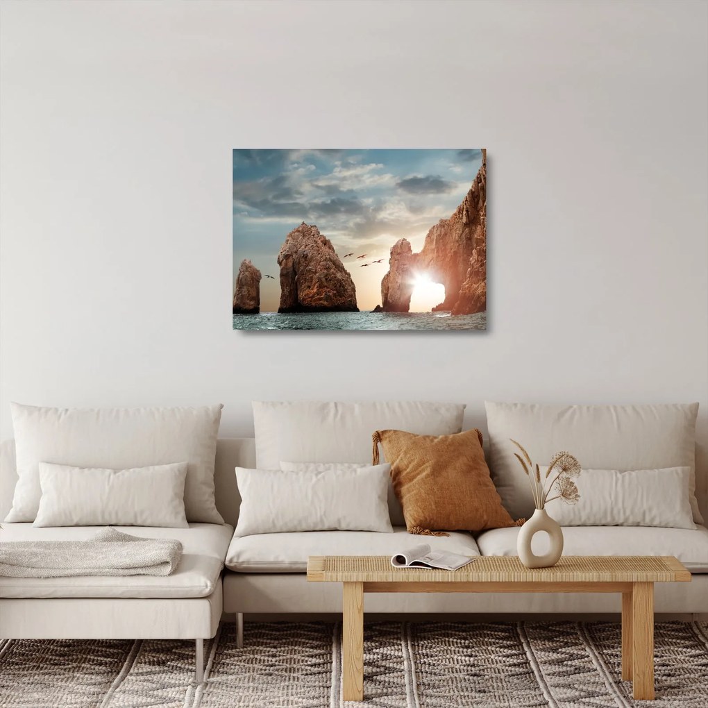 Kép - Naplemente a sziklák felett (üvegen) (70x50 cm)