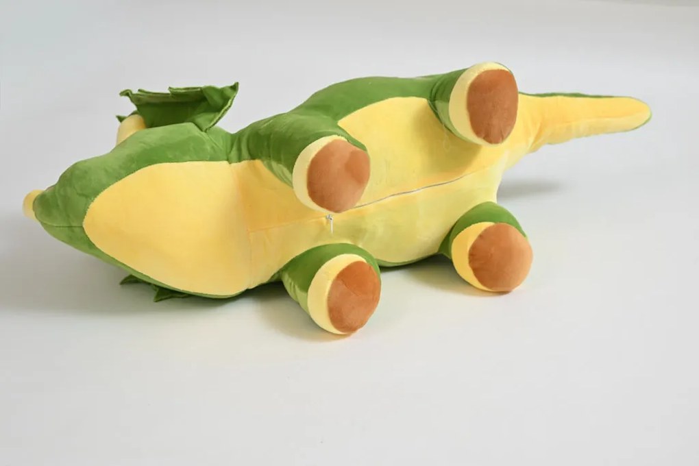 Plüss DÍNÓ zöld babatakaróval belül