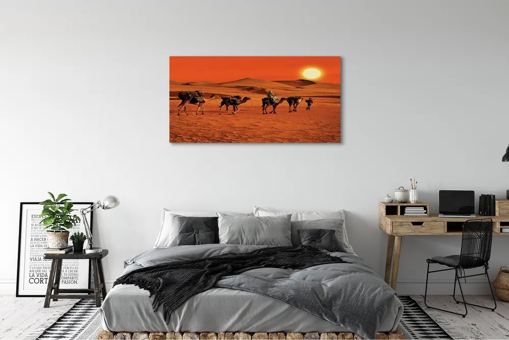 Canvas képek Tevék az emberek sivatagi nap ég 125x50 cm