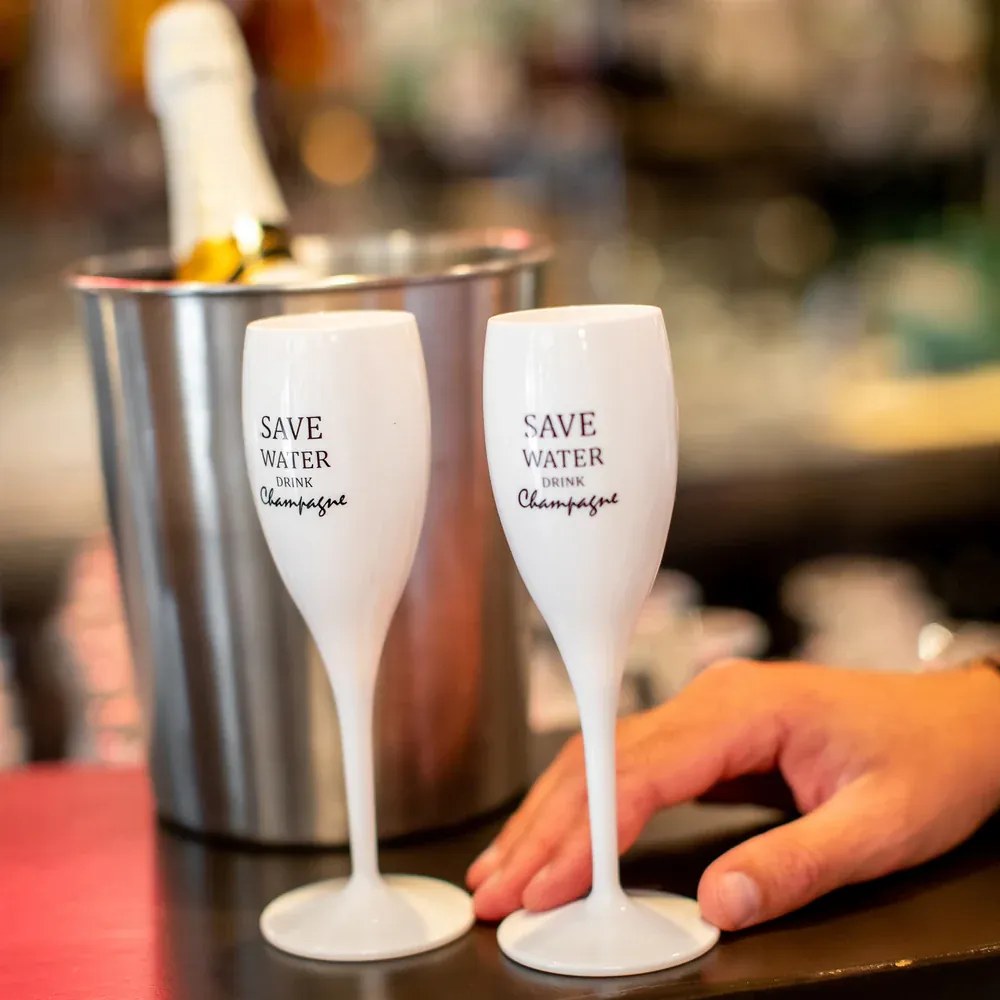 Koziol üvegpohár felirattal - Save water drink champagne