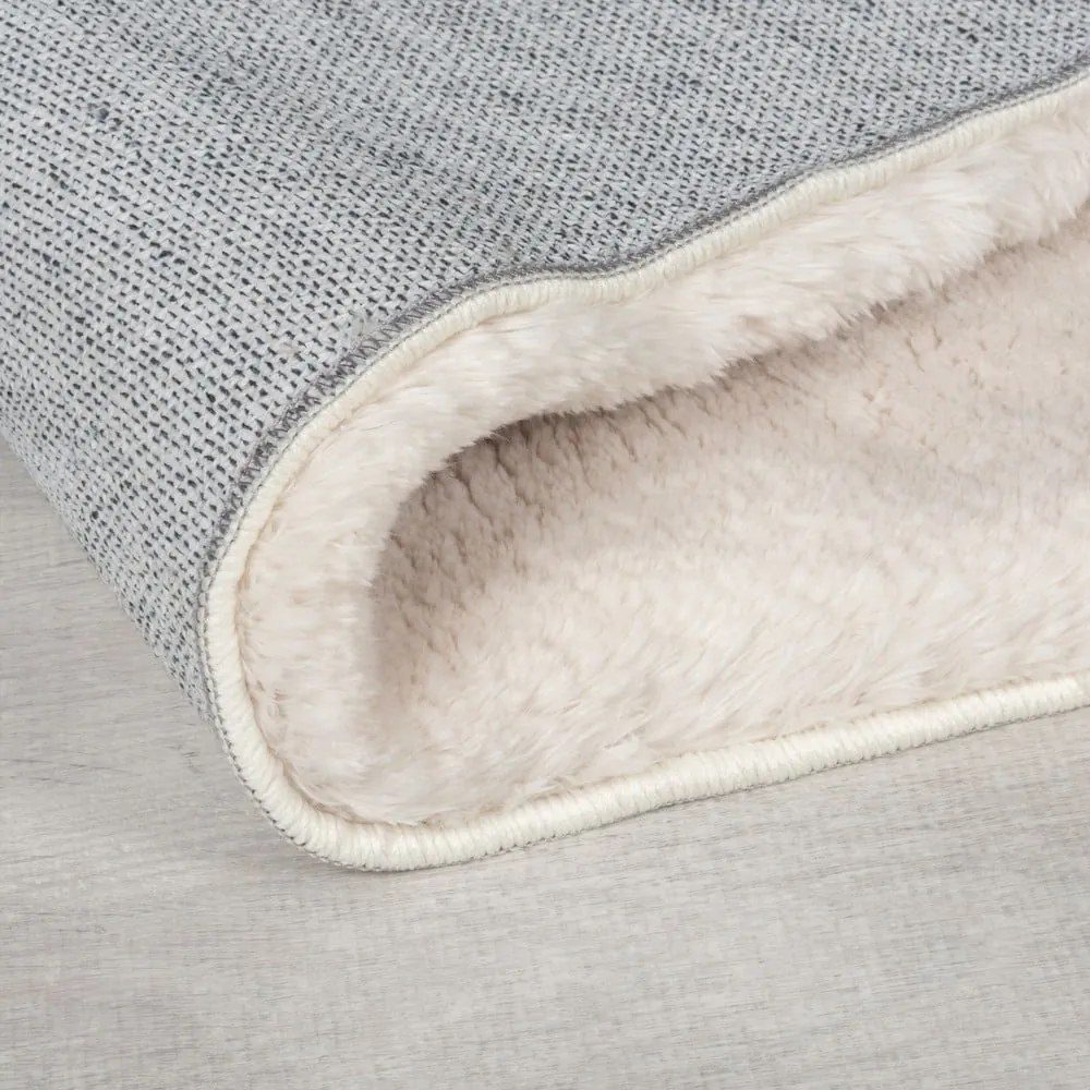 Krémszínű szintetikus szőrme szőnyeg 80x150 cm Faroe Wool Look Fur – Flair Rugs