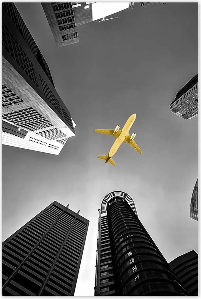 Poszterek 60x90 Sárga repülőgép a város felett