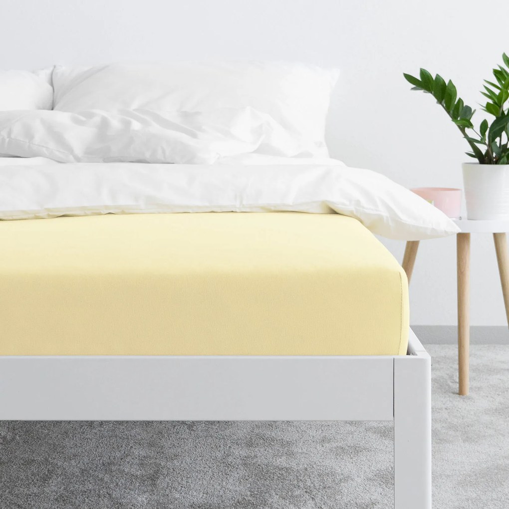 Goldea jersey körgumis lepedő - banán sárga 200 x 220 cm