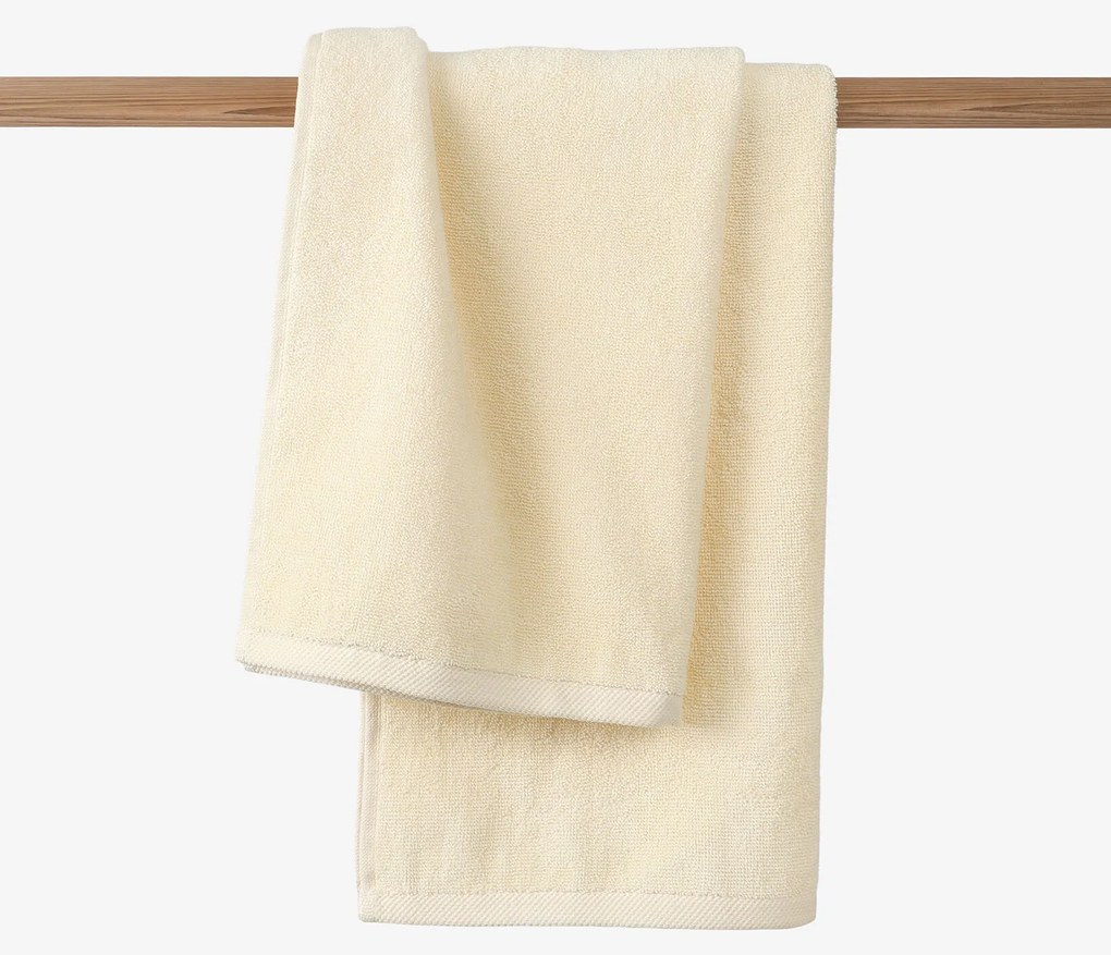 Goldea bordűr nélküli frottír törölköző és fürdőlepedő soft – krémszínű 70 x 140 cm