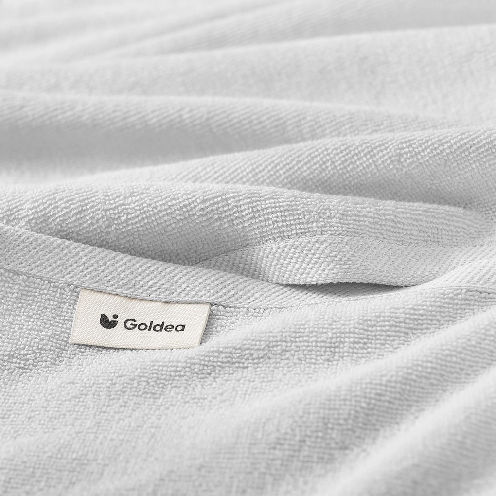 Goldea bordűr nélküli frottír törölköző és fürdőlepedő soft – szürke 50 x 100 cm