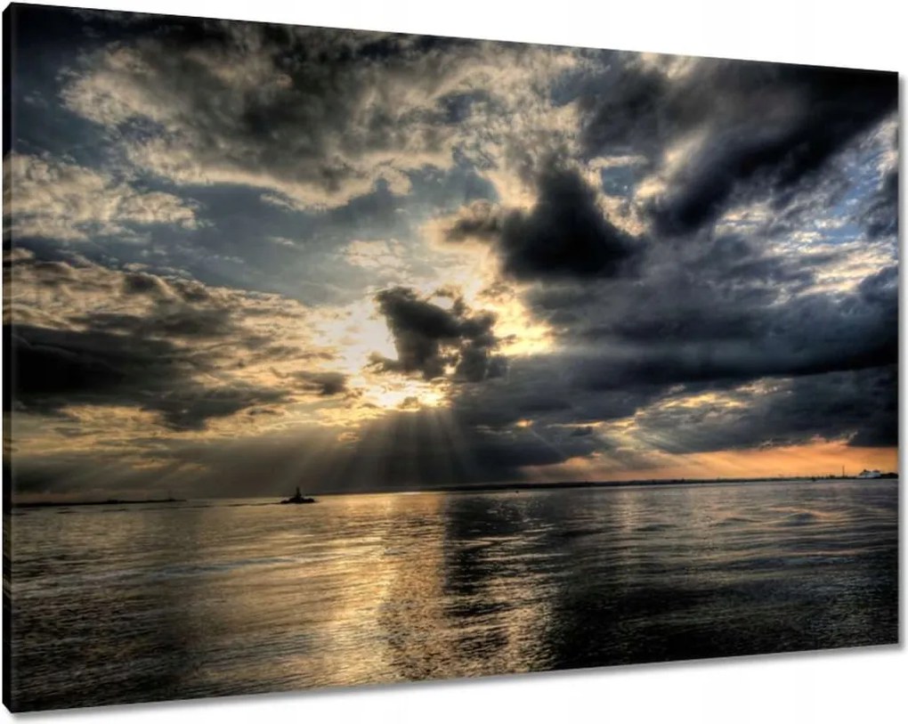 Vászonkép 100x70 Naplemente a felhők között