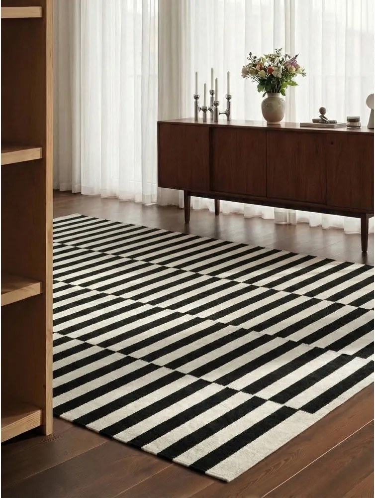 Fekete-fehér kétoldalas kézi szövésű gyapjú szőnyeg 200x300 cm Donna – Hanse Home