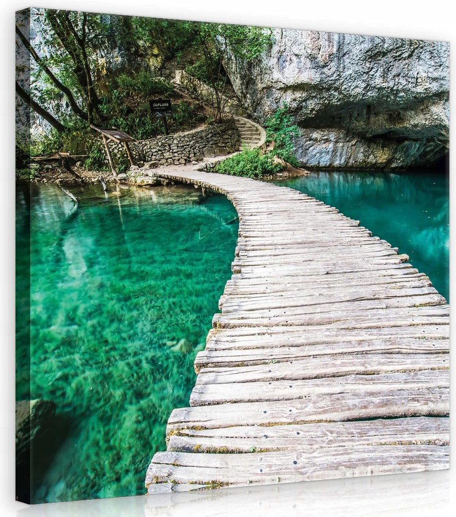 Vászonkép 40x40 Sziklás part Erdei tó csendje Türkiz tisztaság