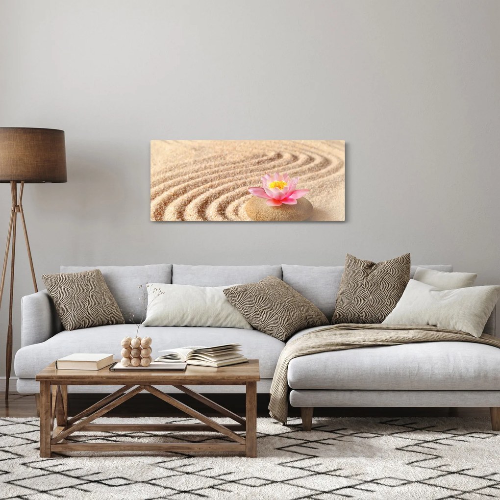 Egy kő, virággal a homokban képe (120x50 cm)