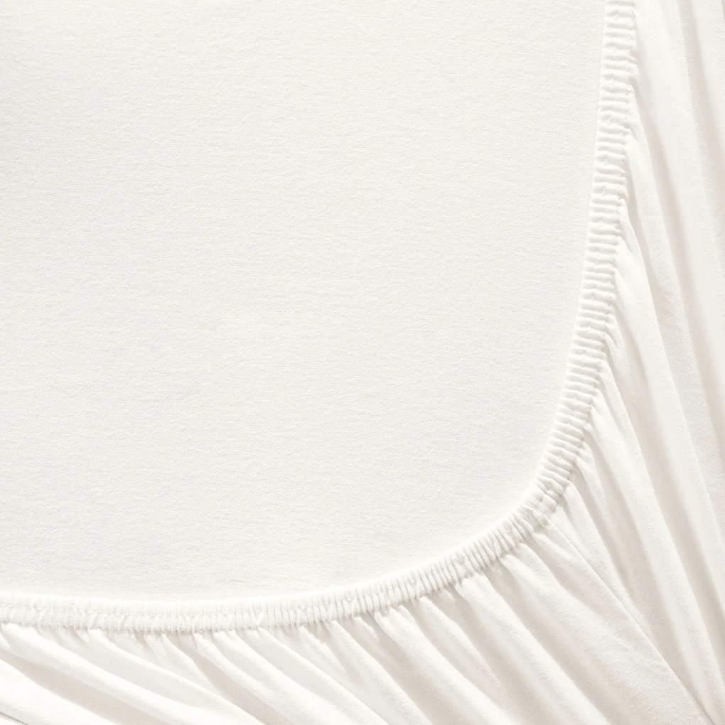 Goldea jersey körgumis lepedő - krémszínű 160 x 200 cm