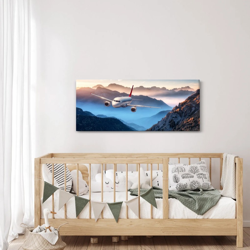 Kép - Repülőgép a hegycsúcsok felett (120x50 cm)