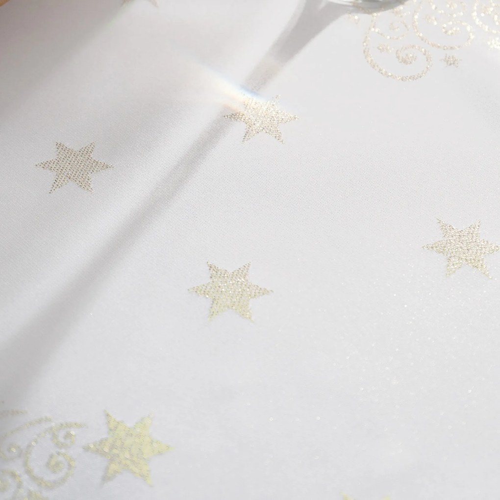 Goldea karácsonyi teflonbevonatú asztalterítő - aranyszínű karácsonyfák és csillagok 100 x 100 cm