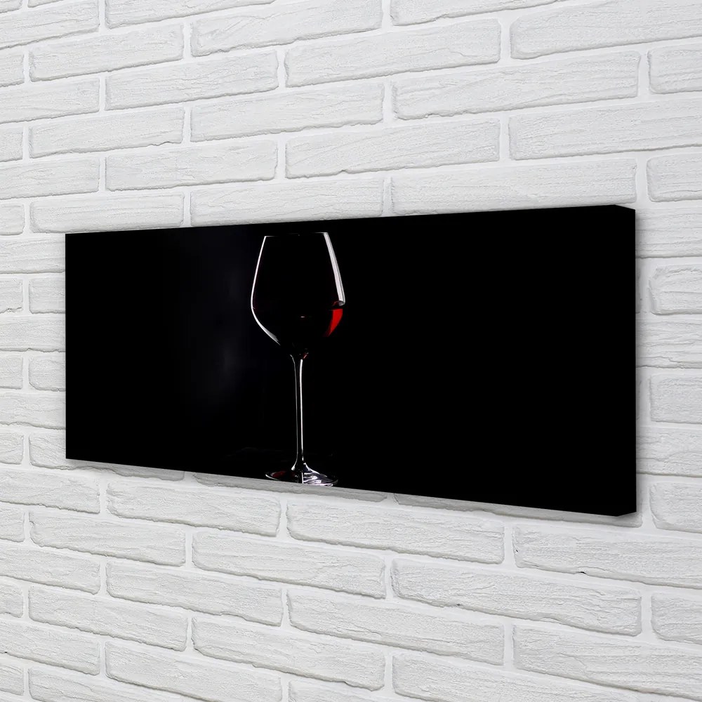 Canvas képek Fekete háttér egy pohár bor 100x50 cm