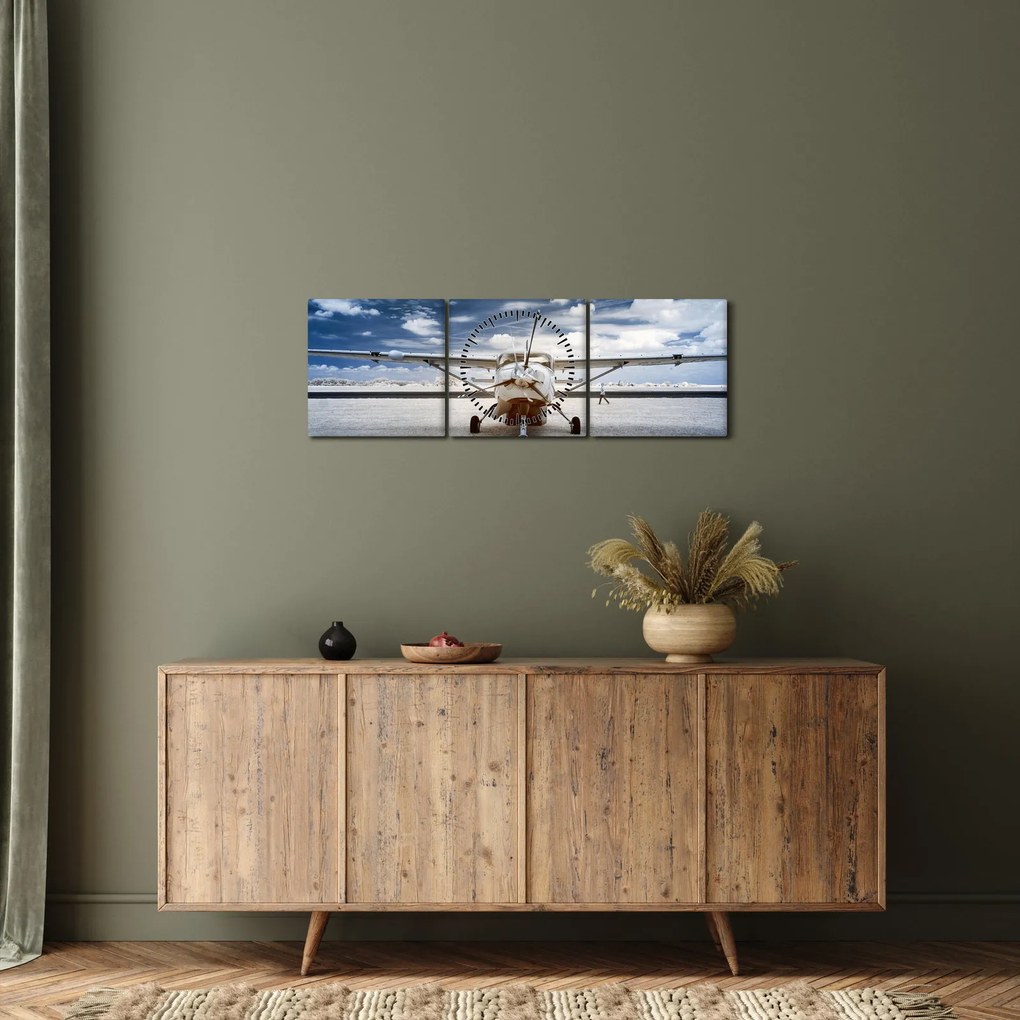 Egy motoros repülőgép képe (órával) (90x30 cm)