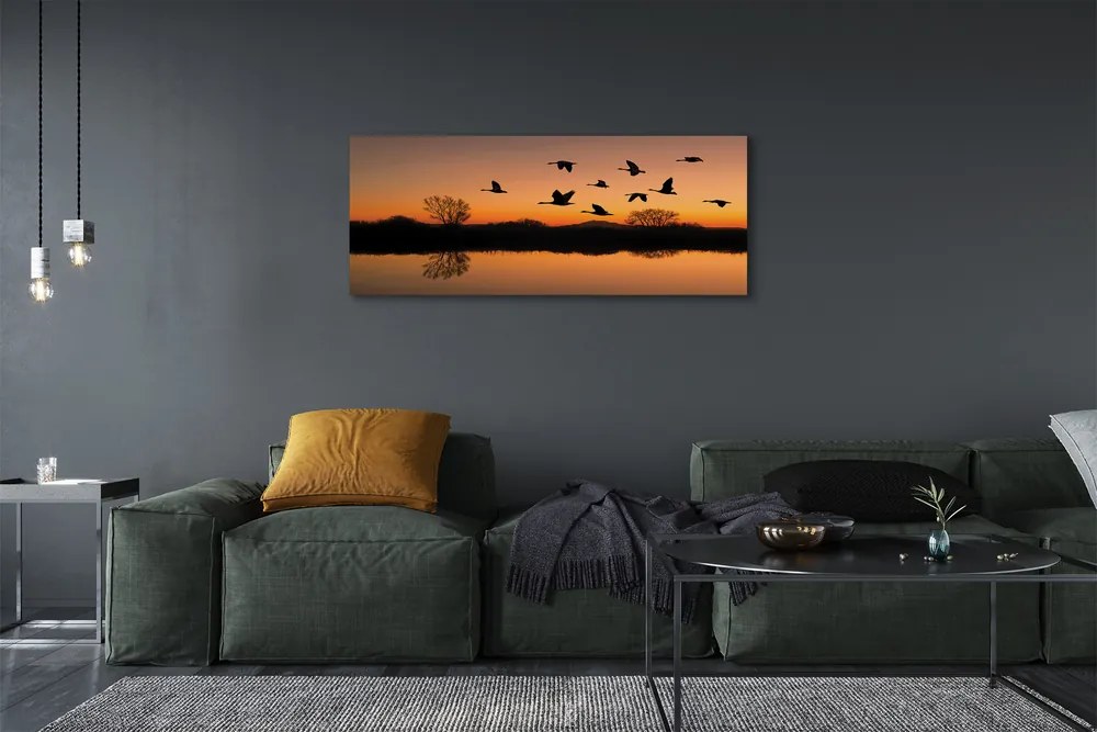 Canvas képek Repülő madarak naplemente 120x60 cm