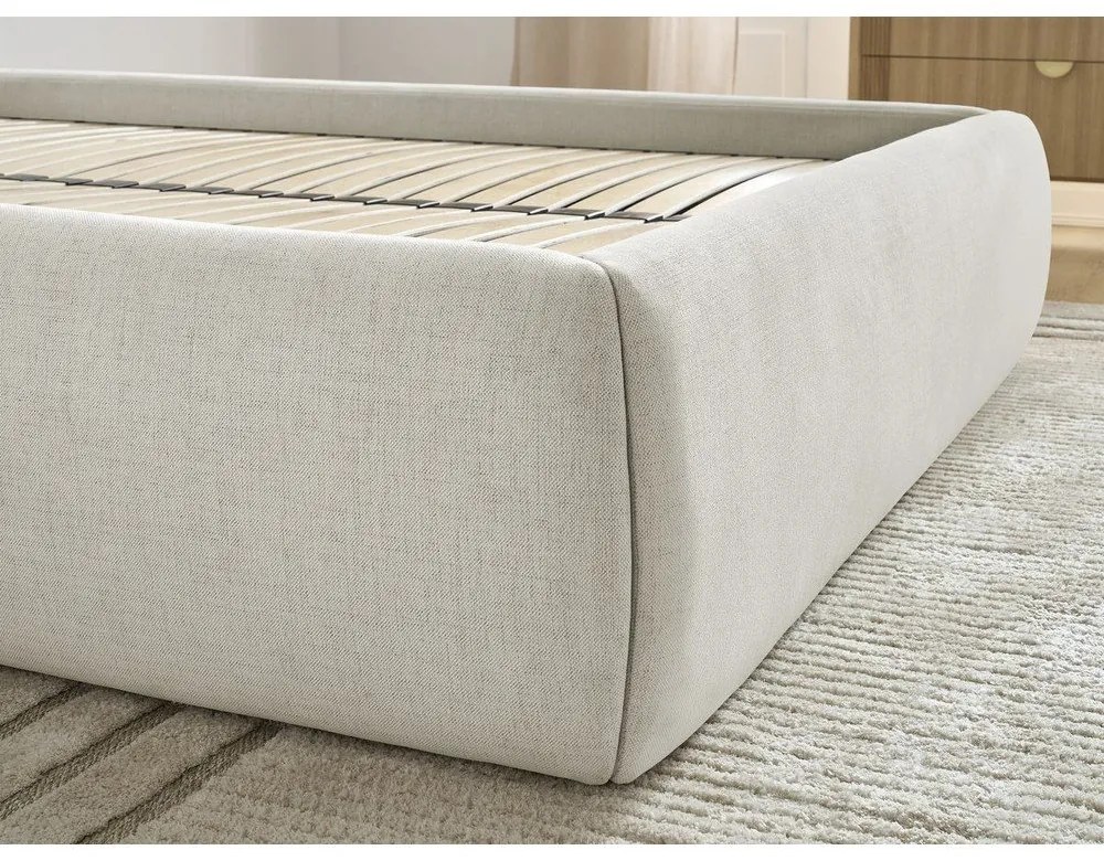 Bézs kárpitozott ágyneműtartós franciaágy ágyráccsal, ágytámla nélkül 180x200 cm Inera – Bobochic Paris