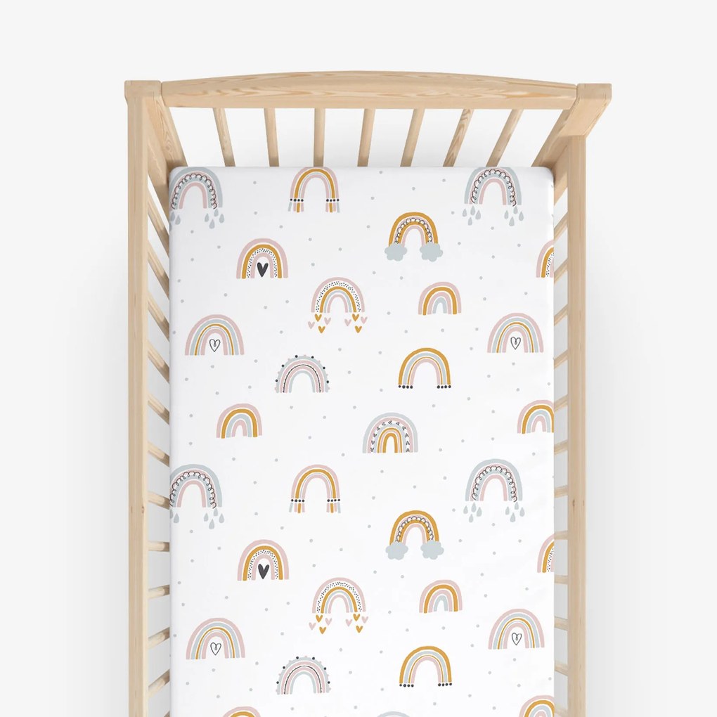 Goldea gyermek gumis pamut lepedő kiságyba - festett szivárványok 60 x 120 cm