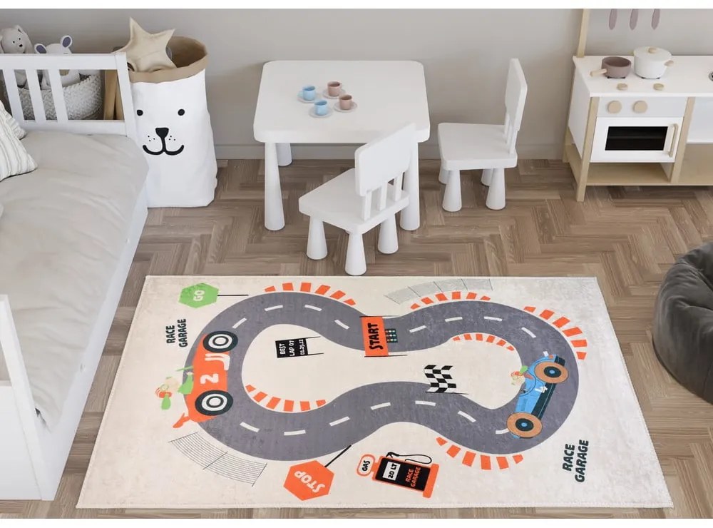 Krémszínű mosható gyerek játszószőnyeg 80x120 cm Race Garage – Vitaus