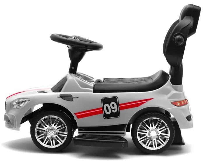 Zenélő bébitaxi vezetőrúddal Baby Mix RACER fehér