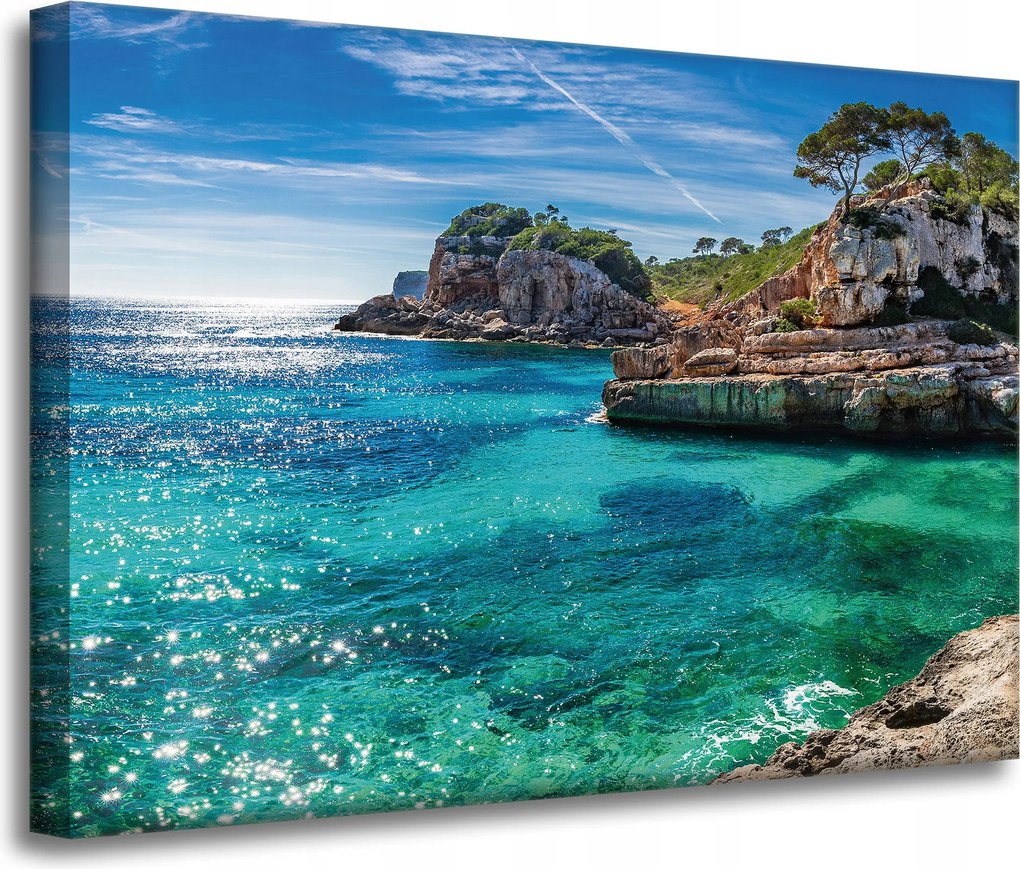 Vászonkép Tájkép Sziklák Víz Fák Nap 70x50 cm