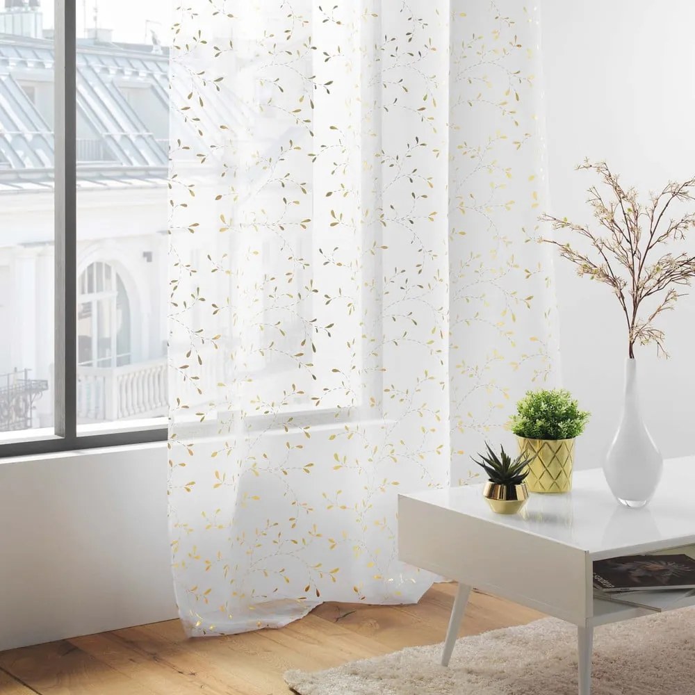Fehér-aranyszínű voile fényáteresztő függöny 140x280 cm Floressia – douceur d'intérieur