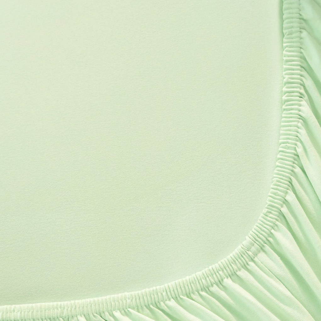 Goldea jersey gumis lepedő - világoszöld 200 x 220 cm