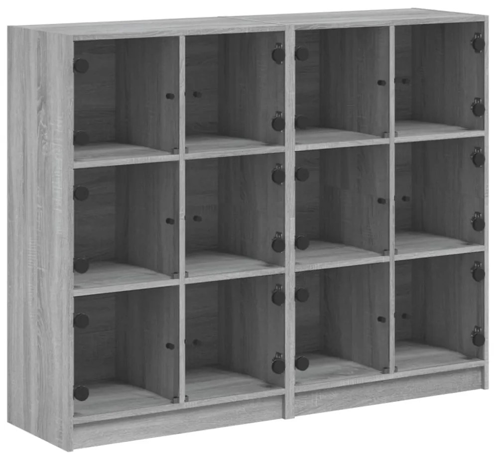 szürke sonoma szerelt fa könyvespolc ajtókkal 136x37x109 cm