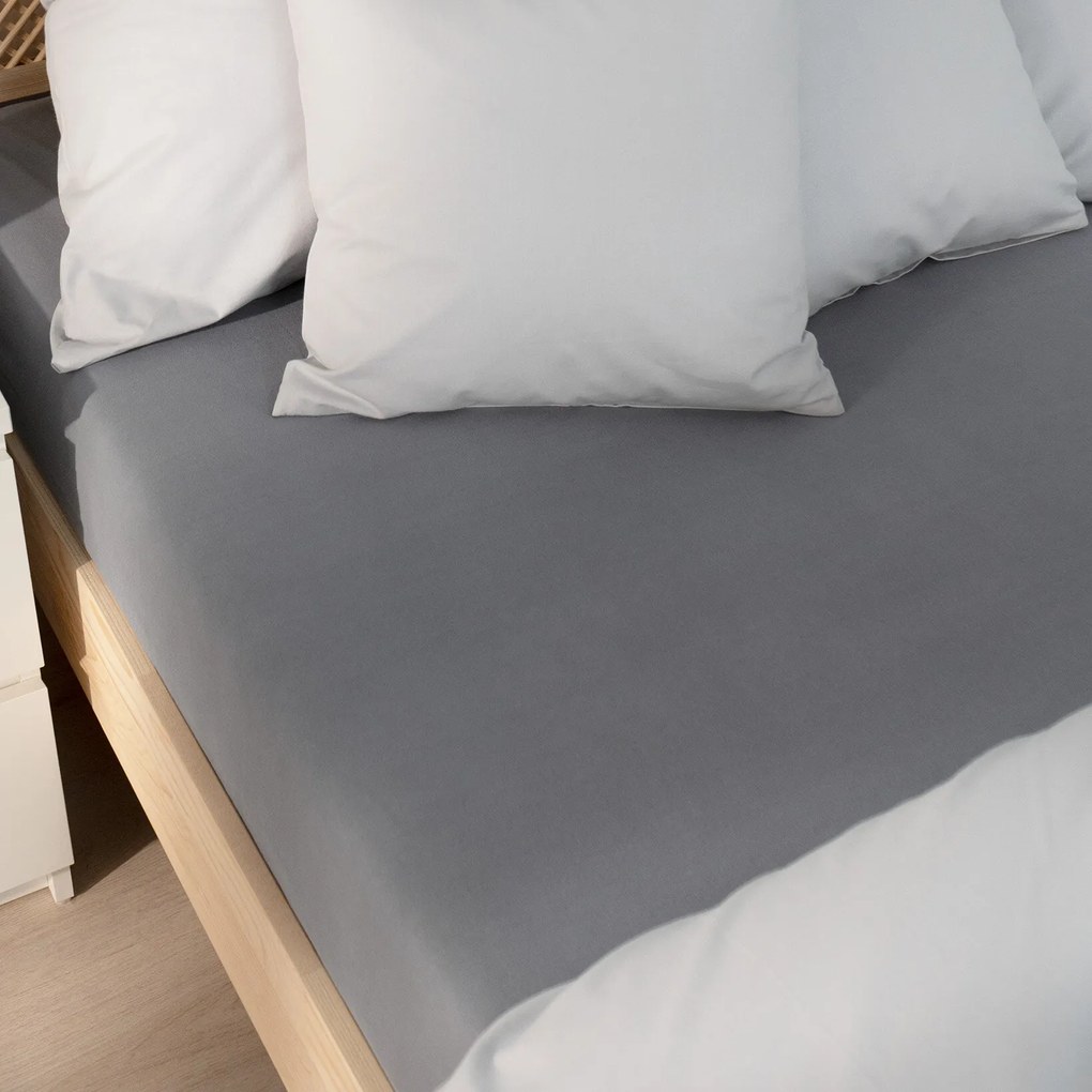 Goldea jersey gumis lepedő - sötétszürke 90 x 200 cm