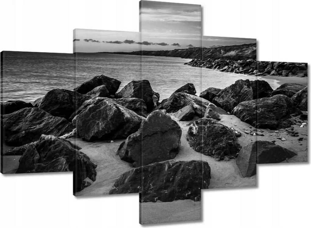 Vászonkép 100x70 Szikla a tengerparton Fekete-fehér