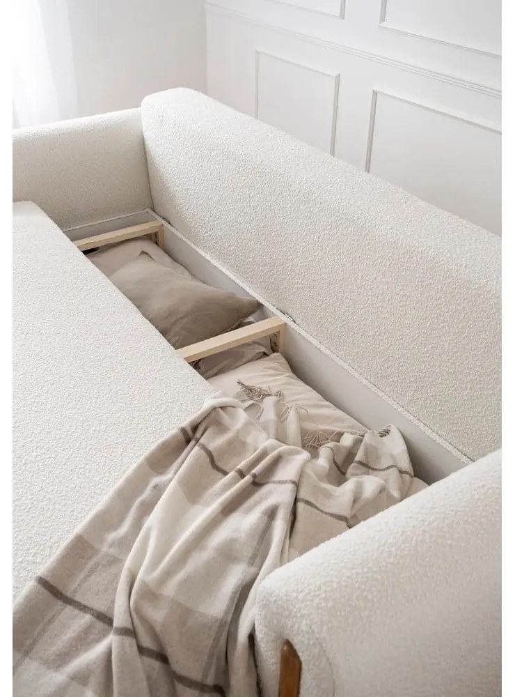 Elefántcsont színű buklé kinyitható-tárolóhelyes kanapé 244 cm Arcadova – ELTAP