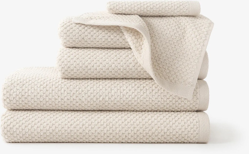 Goldea pamut frotír törölköző / fürdőlepedő micro pure - mandulaszín 50 x 100 cm