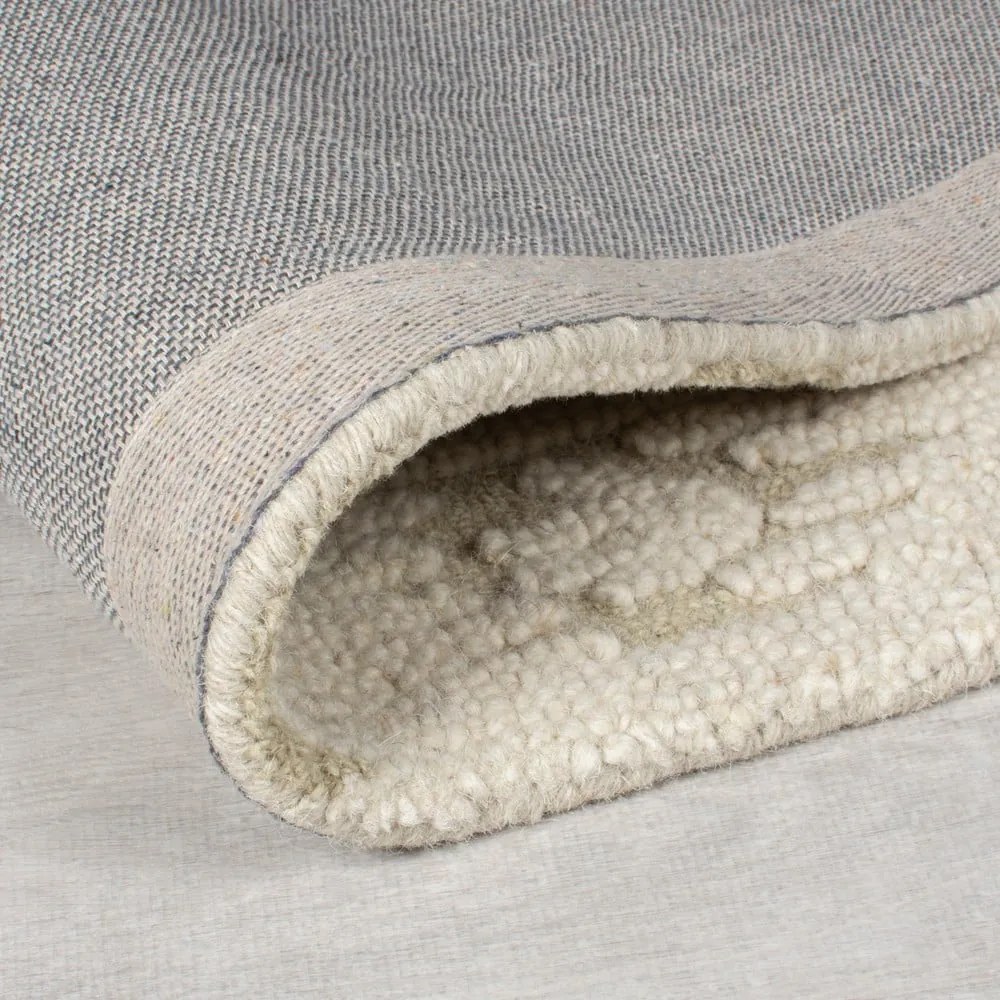 Bézs kézi szövésű gyapjú szőnyeg 160x230 cm Dion Ikat – Flair Rugs