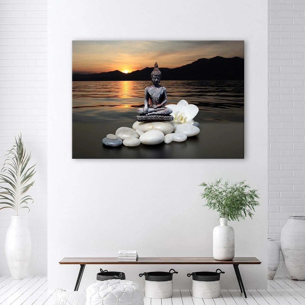 Gario Vászonkép Buddha naplementés háttérrel Méret: 100 x 70 cm