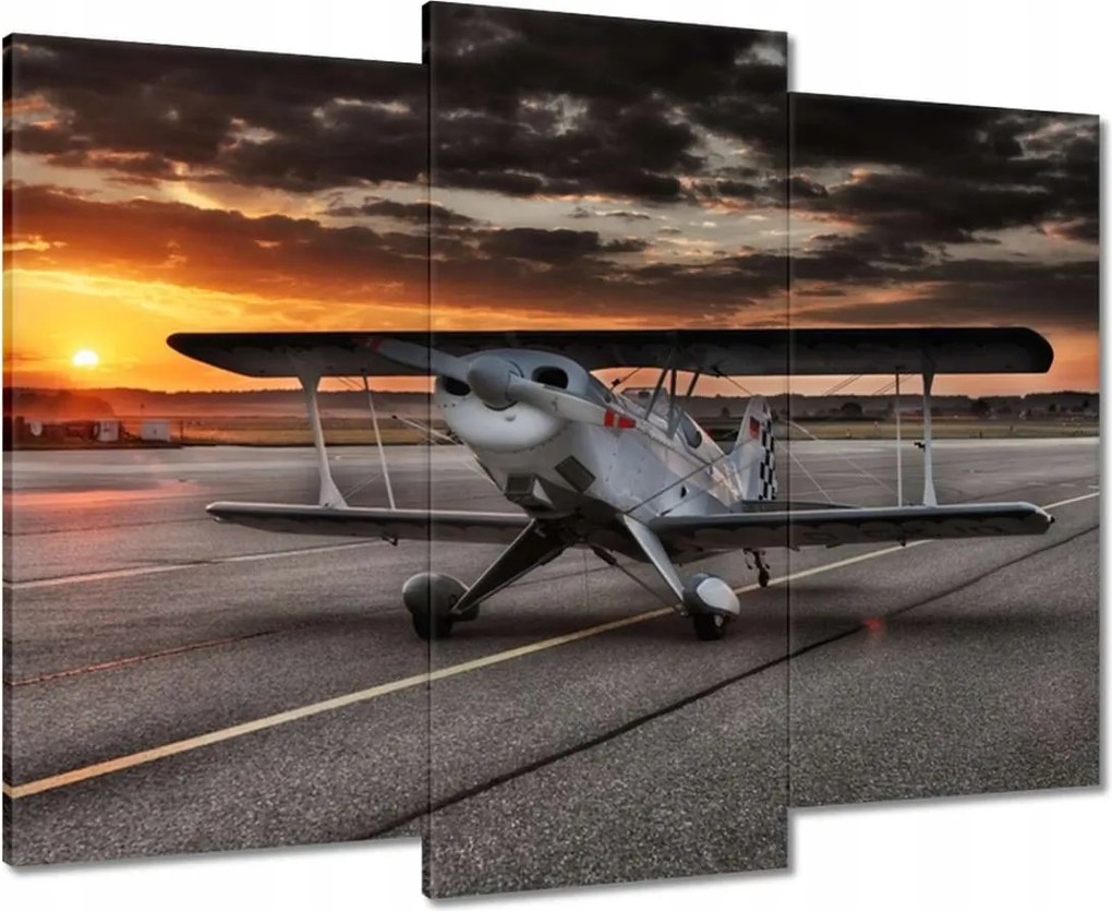Vászonkép 90x70 Repülőgép naplemente