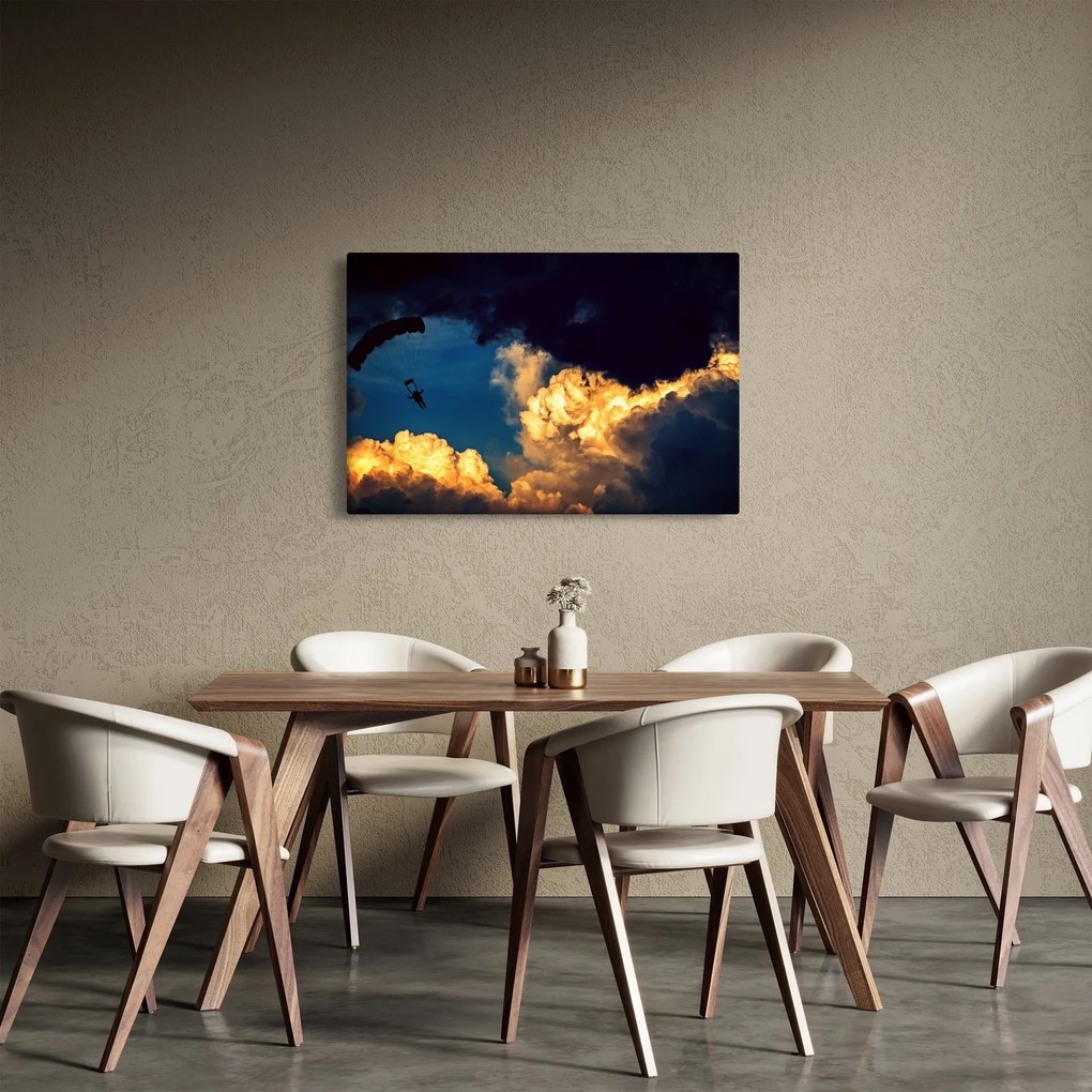 Ejtőernyős a felhőkben képe (90x60 cm)