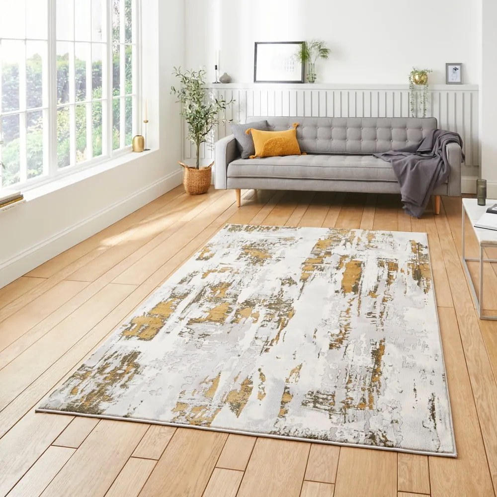 Világosszürke-aranyszínű szőnyeg 80x150 cm Apollo – Think Rugs