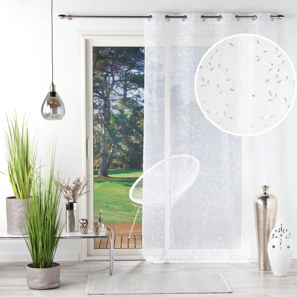 Fehér-ezüstszínű voile fényáteresztő függöny 140x240 cm Floressia – douceur d'intérieur