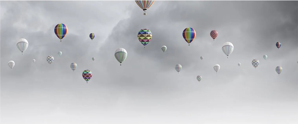 Kép - léggömbök egy téglafal felett (120x50 cm)