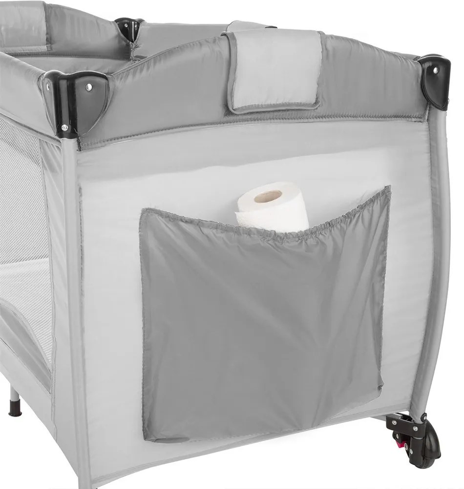 Utazóágy pelenkázó lappal és játékhíddal, szürke