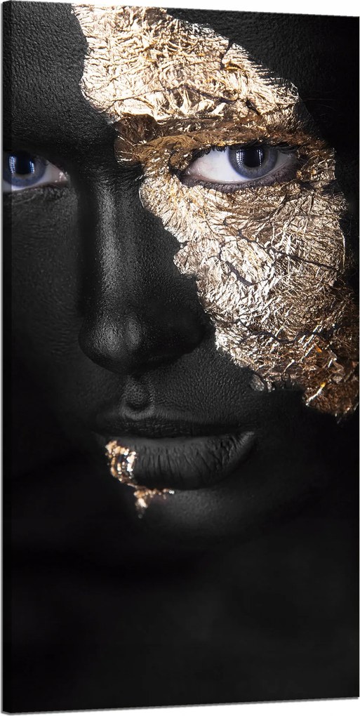 Vászonkép Fekete arc aranyra festve 60x120 cm