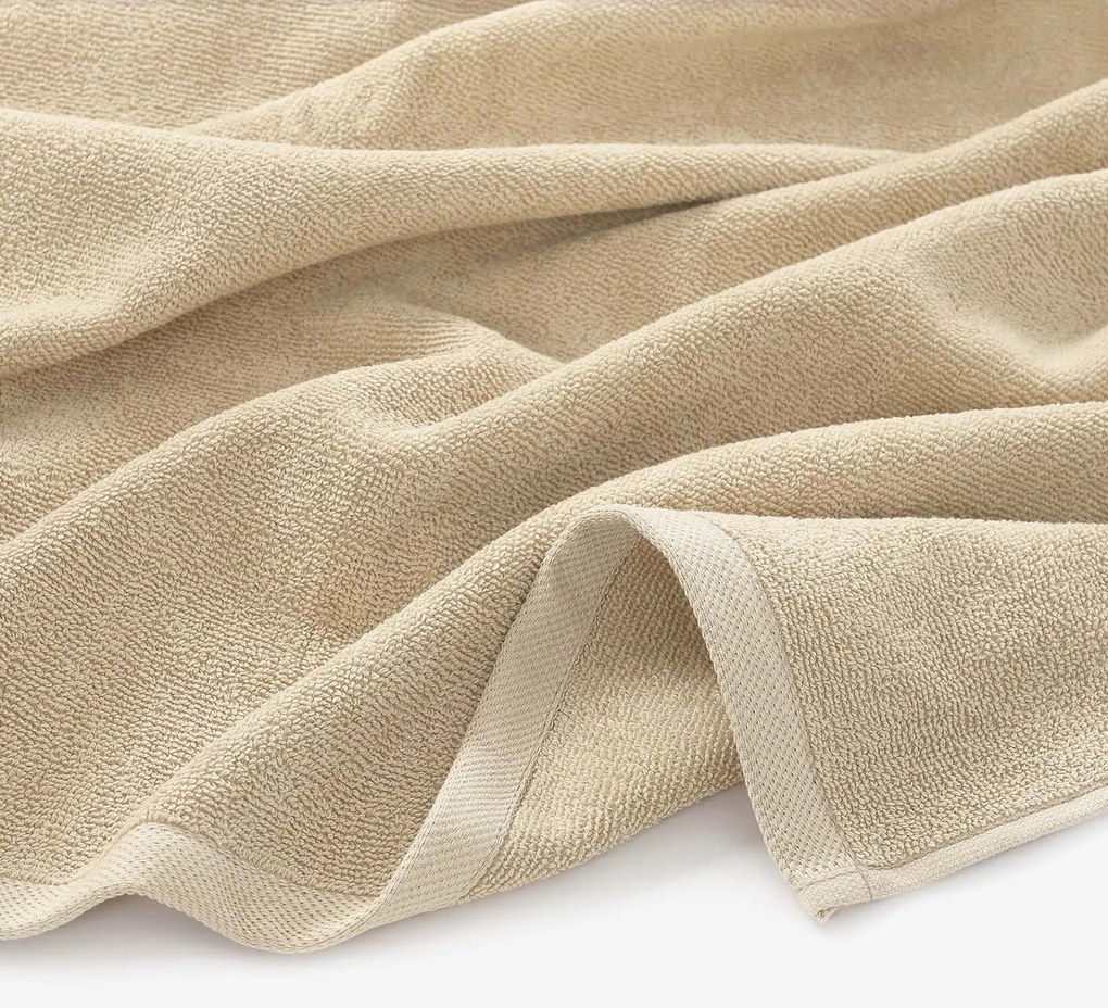 Goldea bordűr nélküli frottír törölköző és fürdőlepedő soft – bézsínű 30 x 50 cm