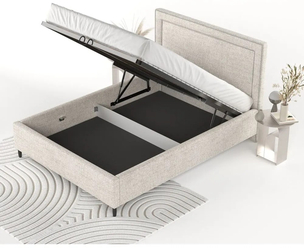 Krémszínű kárpitozott ágyneműtartós franciaágy ágyráccsal 140x200 cm Baleine – Maison de Rêve