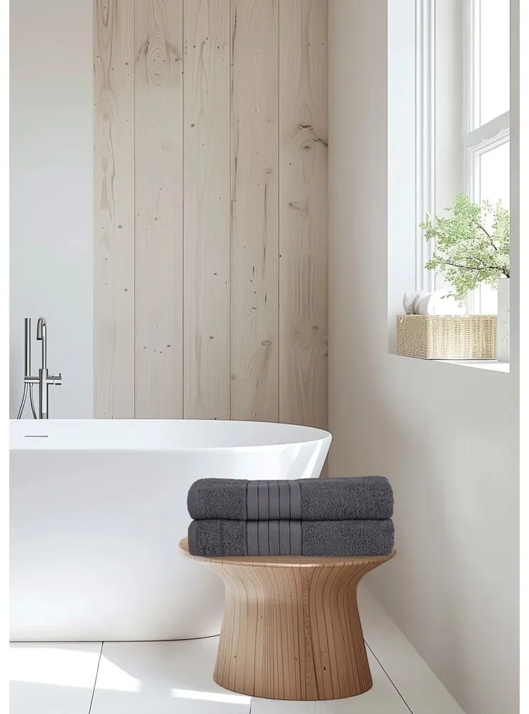 Antracitszürke frottír pamut fürdőlepedő szett 2 db-os 70x140 cm – Good Morning