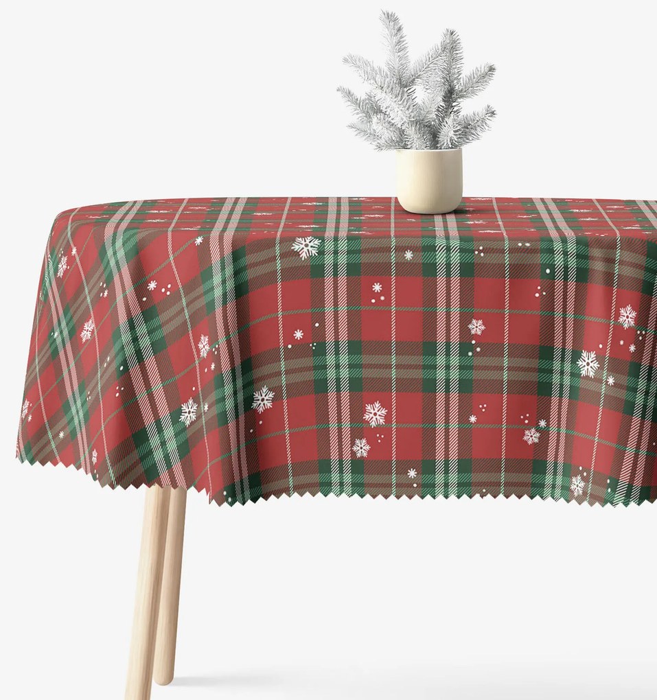 Goldea karácsonyi ovális teflonos terítő - piros kockás hópelyhekkel 140 x 220 cm