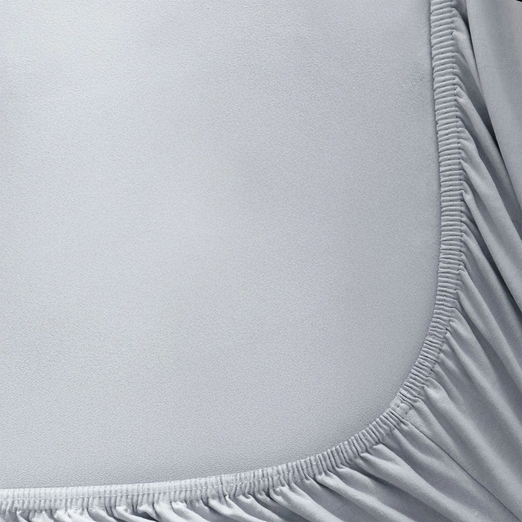 Goldea jersey gumis lepedő - szürke 140 x 200 cm