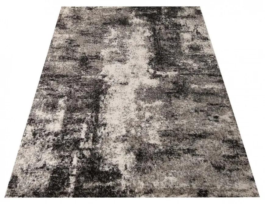 Modern bézs-barna mintás szőnyeg a nappaliba Szélesség: 120 cm | Hossz: 170 cm
