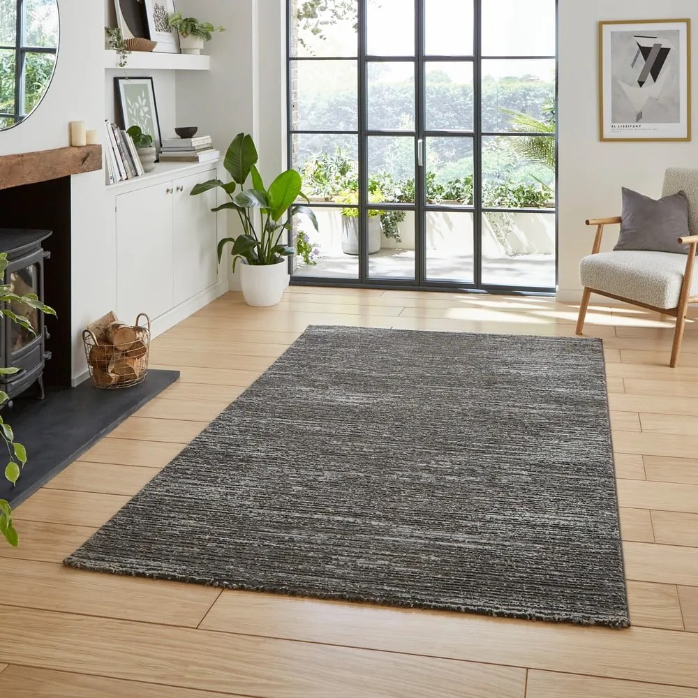 Sötétszürke mosható szőnyeg újrahasznosított szálakból 120x170 cm Flores – Think Rugs