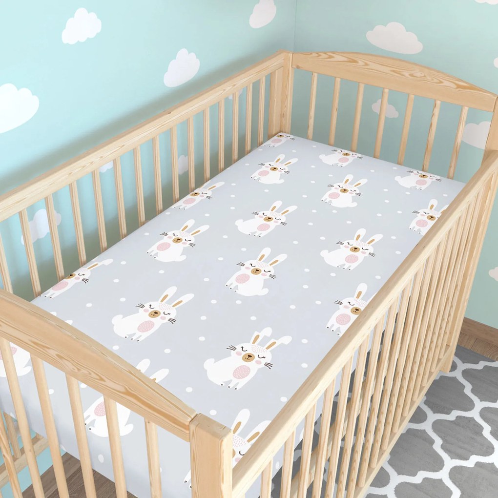 Goldea gyermek gumis pamut lepedő kiságyba - álmodozó nyuszik 60 x 120 cm